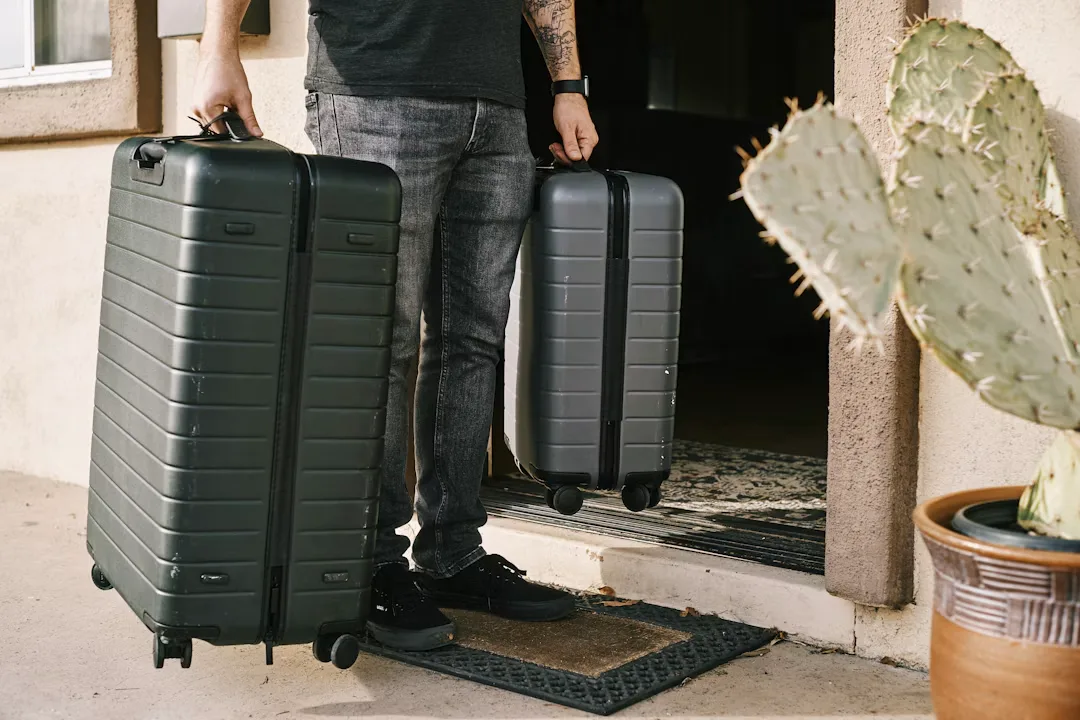 Neatly packed carry on suitcase with compression cubes travel clothes and passport